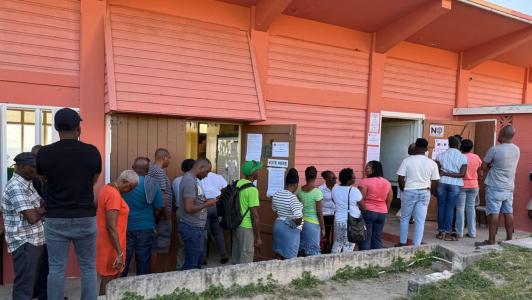 Citizens wait to cast their vote in the 2026 Antigua and Barbuda elections 