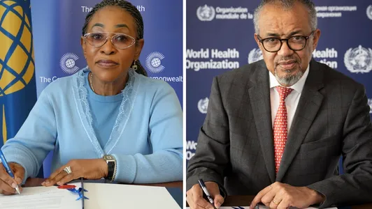 Commonwealth Secretary-General, Hon Shirley Botchwey, and the WHO Director-General, Dr Tedros Adhanom Ghebreyesus, signing an MOU
