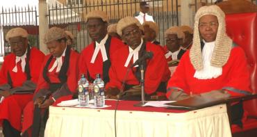 Judges in a seating in a row