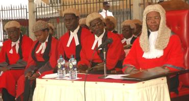 Judges in a seating in a row