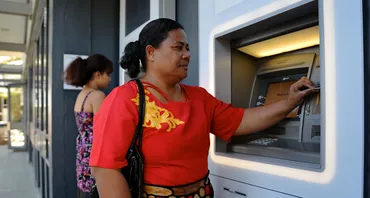 Woman at bank, Tonga