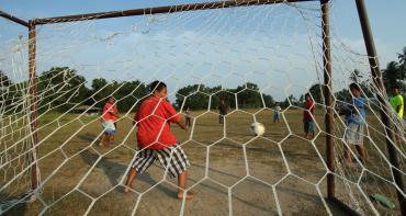 Children playing soccer