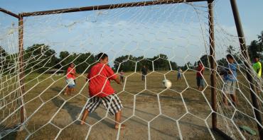 Children playing soccer