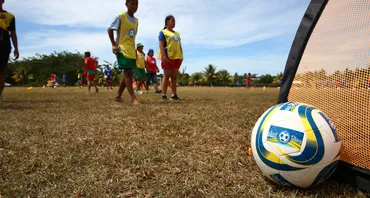 Football with players in background