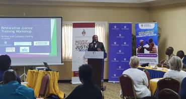 Woman speaking at the training