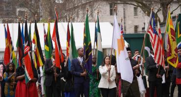 Flag bearers from Commonwealth countries, including Cyprus, outside Westminster Abbey at the 2022 Commonwealth Day service