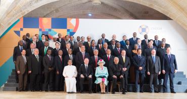 Family photo of Commonwealth leaders and Her Late Majesty Queen Elizabeth II at the 2015 Commonwealth Heads of Government Meeting in Malta.