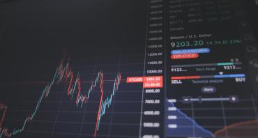 Financial stock graph on laptop