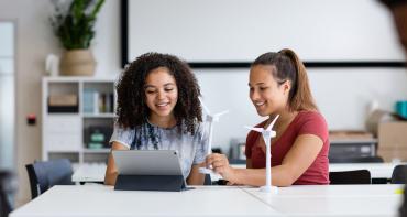 High school students studying renewable energy