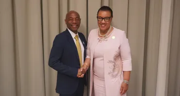 Secretary-General and the President of CDB shaking hands