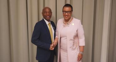 Secretary-General and the President of CDB shaking hands