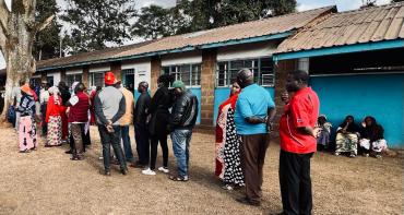 Voters wait to cast their vote in the 2022 Kenya general elections