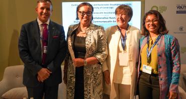 A group photo of the panel of speakers at the COMPASS event 