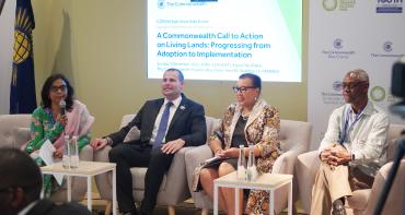 The panel at the implementation of the Living Lands Charter event at COP28