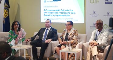 The panel at the implementation of the Living Lands Charter event at COP28