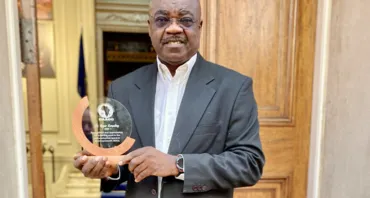 Dr Roger Koranteng with Governmeent of Botswana Award