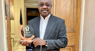 Dr Roger Koranteng with Governmeent of Botswana Award