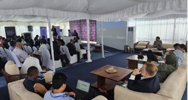 A speaker gives a presentation at the Connectivity Agenda event at Commonwealth Law Ministers Meeting in Zanzibar