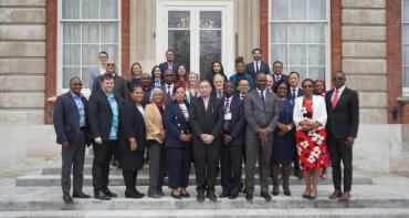 Family photo of delegates at CACH in London