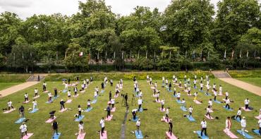 People-attend-yoga-on-the-front-lawn-of-marlborough-house