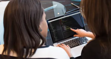 Two women on a laptop