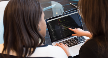 Two women on a laptop