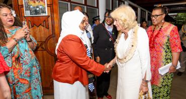 The Queen meets a young woman at the Advocating for Women and Girls in the Commonwealth CHOGM 2024 event