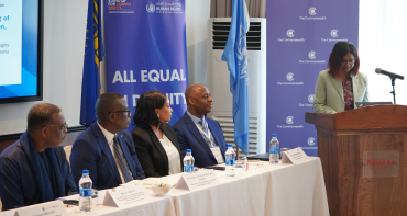 Conference with speaker at podium