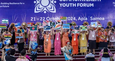 Commonwealth Youth Forum at CHOGM 2024 flags on stage