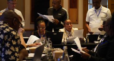 People sat around a desk