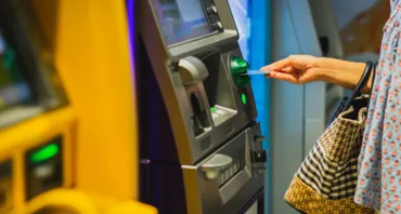 Person using ATM