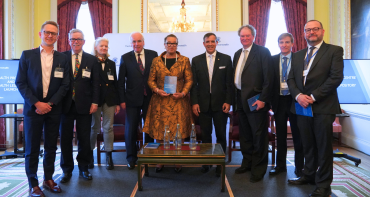 SG Scotland and 8 others standing posing in a group picture