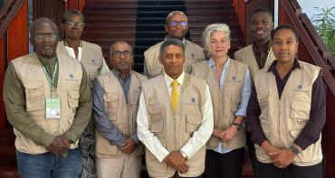 8 people standing for a group pic