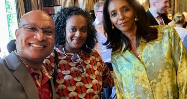 three people posing for a selfie picture