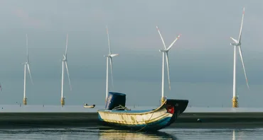 Solar panel in local area with fishing boat