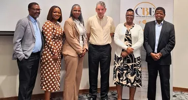 A group photo of Mac Banda with Eswatini debt officials