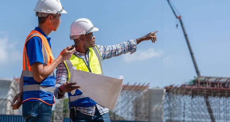 two men planning large infrastructure project